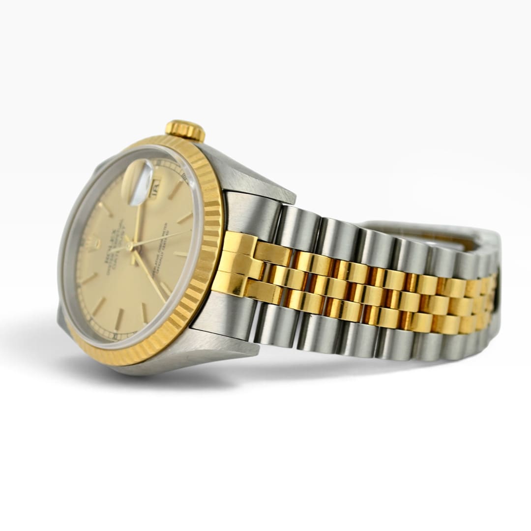 Rolex Datejust 16233 champagne dial, fluted 18K gold bezel and two-tone Jubilee bracelet