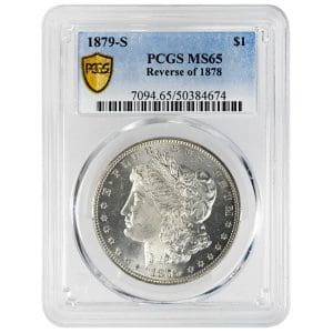 1879 S Morgan Silver Dollar Reverse of 1878 in a PCGS MS65 holder, showing Liberty facing left with bright white luster