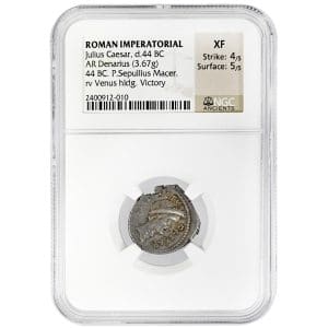 Julius Caesar AR Denarius in an NGC Ancients holder, showing the wreathed portrait of Julius Caesar facing right with CAESAR legend