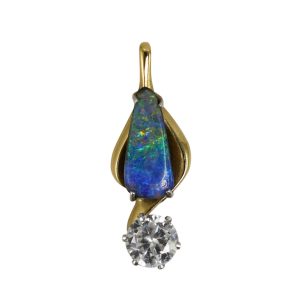 14k Yellow Gold Pear Shaped Boulder Opal pendant with Cubic Zirconia