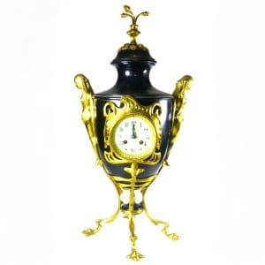 Large urn-style clock with 2 Maidens flanking the side